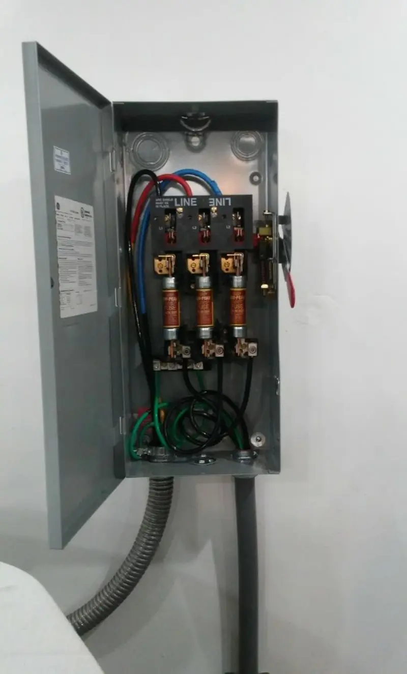 Three-phase disconnect switch installed for Smoke Detector Installation in North Liberty